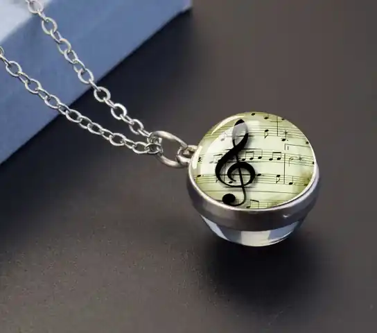 Skleněný kulatý náhrdelník s motivem houslového klíče Nová Kolekce